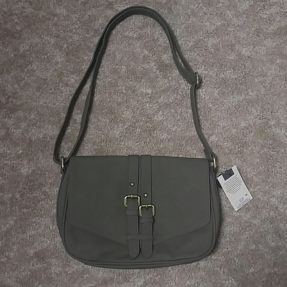 Green purse with gold buckles